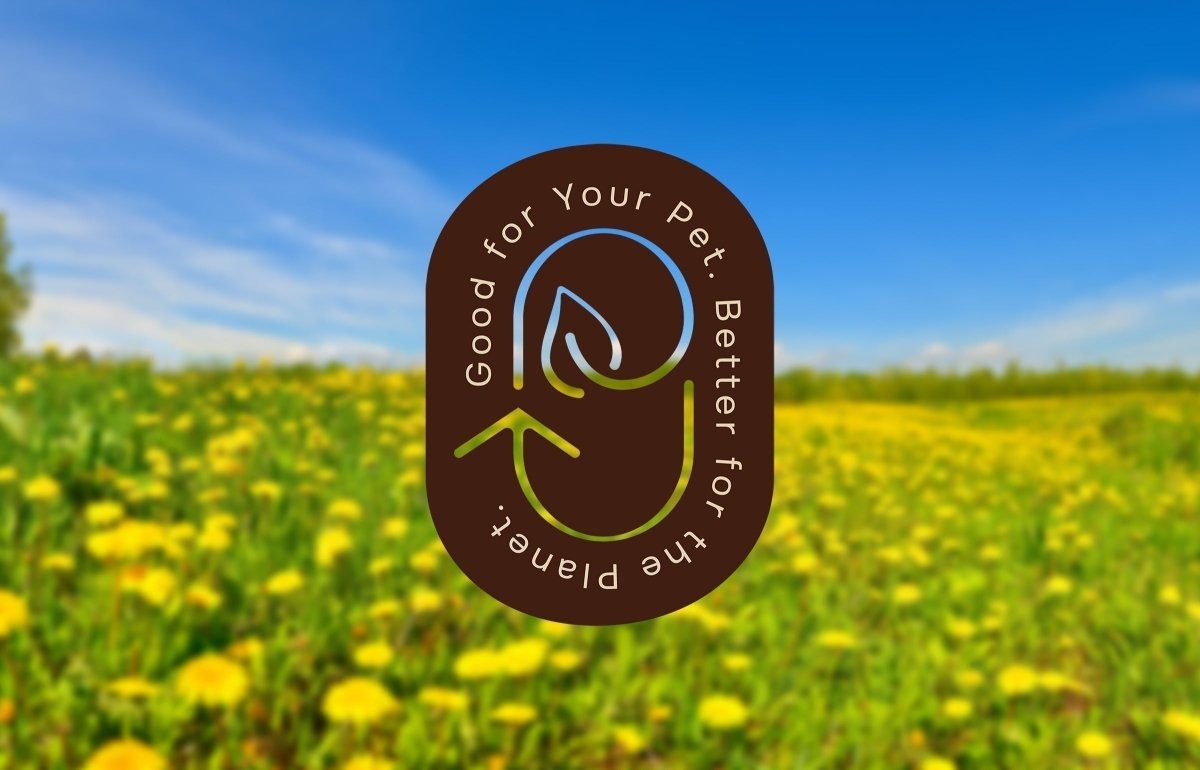 Good for your pet. Better for the planet graphic in brown over blurred out image of yellow dandelions on green field under blue sky.